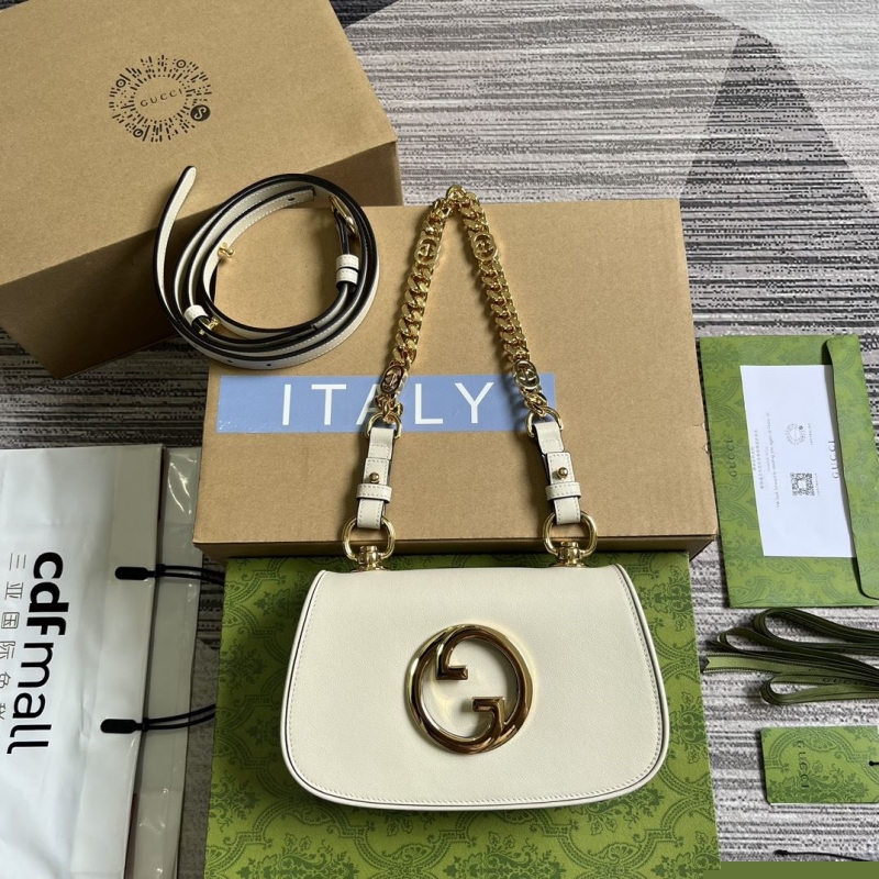 G*u*i top handle bags